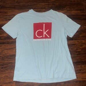 Calvin Klein Light Blue Tee with Red Logo